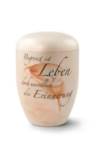 Beige Urne mit dem Schriftzug „Begrenzt ist das Leben, doch unendlich die Erinnerung“